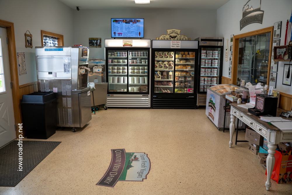 The white desk beside the creamery window is the honor-system payment station, where customers record their purchases and pay with cash or Venmo.